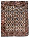 A VERAMIN PERSIAN RUG