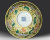 A CHINESE YELLOW-GROUND FAMILLE ROSE BOWL, QING DYNASTY (1644-1911)