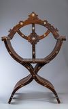 An Islamic mother-of-pearl inlaid wood chair