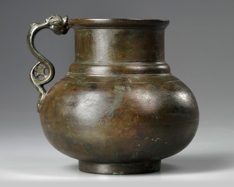 A TIMURID DRAGON-HANDLED JUG, CENTRAL ASIA, LATE 14TH- EARLY 15TH CENTURY