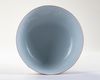 A FINE CORAL-GROUND FAMILLE VERTE 'BOYS' BOWL