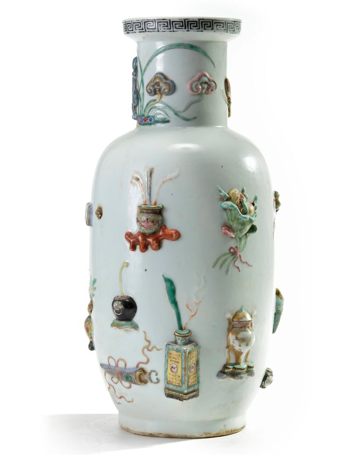 A Chinese famille rose moulded and appliqué 'precious objects' rouleau vase