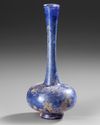 A COBALT BLUE GLASS SPRINKLER FLASK, 9TH–11TH CENTURY