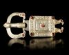A MEROVINGIAN SILVER GILT SQUARE BELT BUCKLE WITH GARNETS,  6TH-7TH CENTURY AD