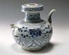 A CHINESE BLUE AND WHITE EWER