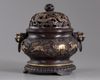 A Chinese parcel-gilt bronze 'sea creatures' censer, cover, and stand