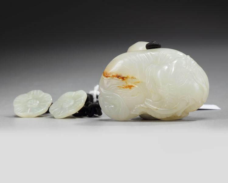 A CHINESE JADE CARVING OF AN ELEPHANT