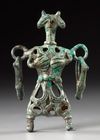 AN AMLASH OPENWORK BRONZE IDOL, CIRCA 1ST MILLENIUM B.C.
