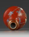 A Chinese coral-ground famille rose 'bird and flowers' garlic-head vase
