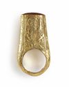 A GOLD-PLATED RING WITH CARNELIAN INTAGLIO, 19TH CENTURY