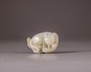 A Chinese pale celadon jade 'cat and dragonfly' carving