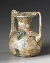 A ROMAN GLASS JAR WITH TWO HANDLES, CIRCA 3RD-4TH CENTURY AD