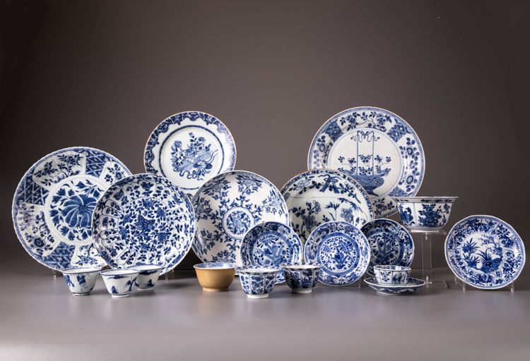 A group of 19 Chinese blue and white cups, saucers and a bowl