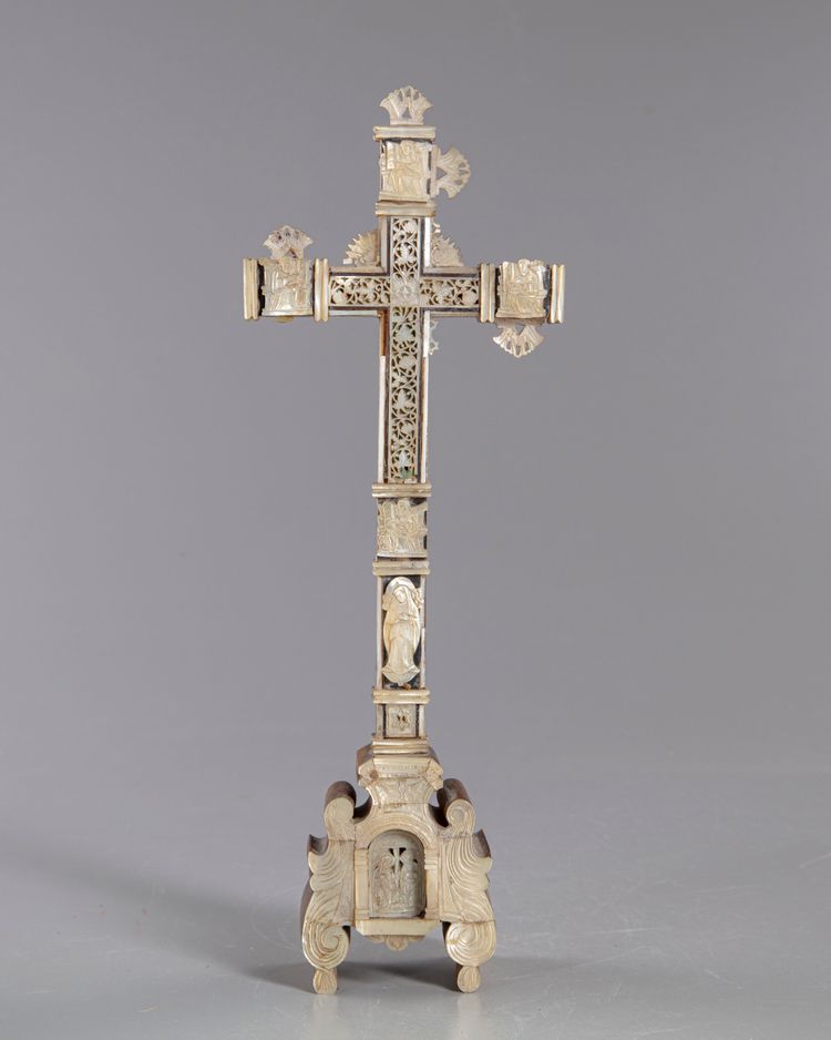 A large mother of pearl cross
