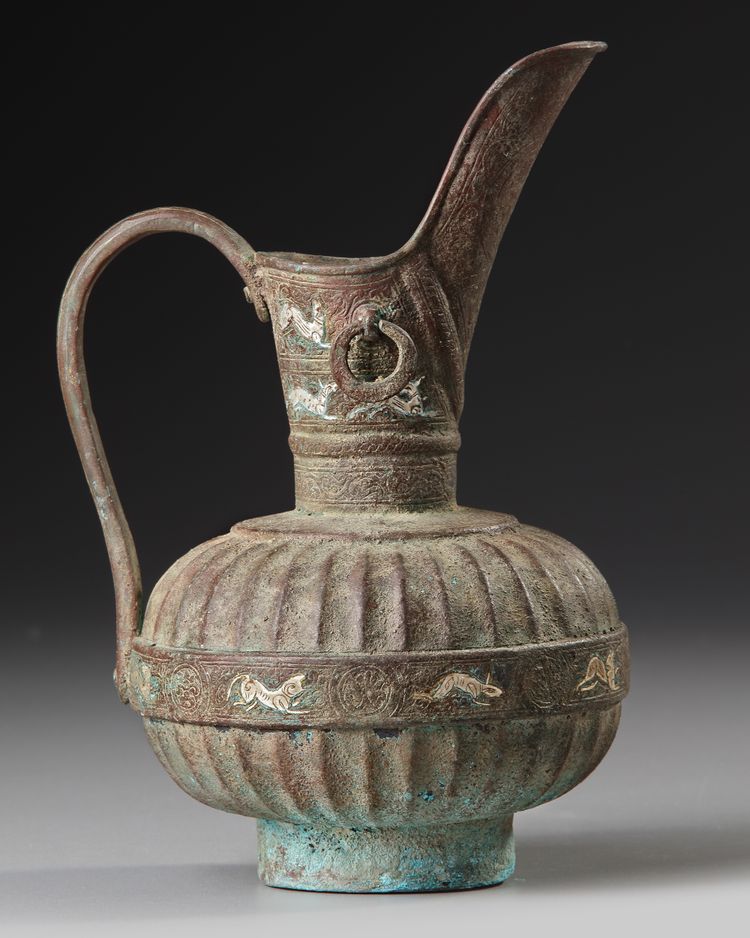 A GILT KHURASAN BRONZE EWER, PERSIA, 12TH-13TH CENTURY