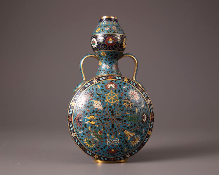 A Chinese cloisonne enamel turquoise-ground 'Eight Buddhist Emblems' moonflask