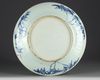 A Large Chinese blue and white 'dragon and flower' charger