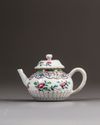A small Chinese famille rose moulded teapot and cover