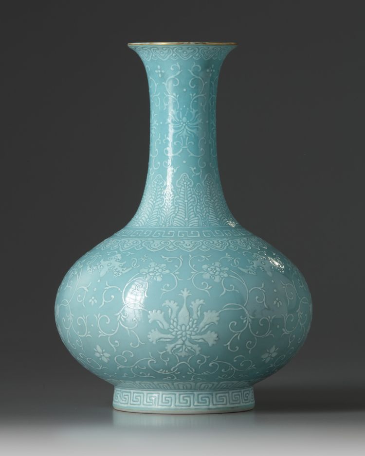 A Chinese turquoise-ground slip-decorated bottle vase