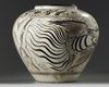 A large Chinese Cizhou-style 'dragon and phoenix' jar