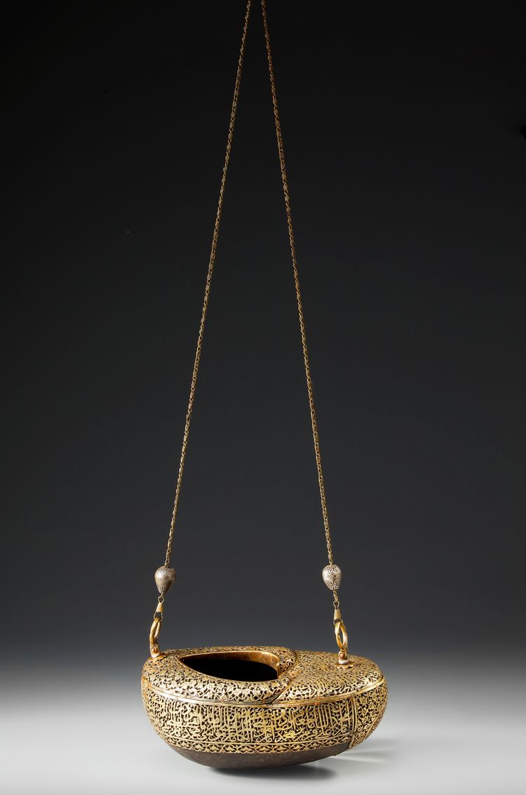 A QAJAR BRASS-MOUNTED COCO DE MER KASHKUL, PERSIA, 19TH CENTURY