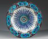 A POLYCHROME POTTERY DISH, SYRIA, 17TH CENTURY