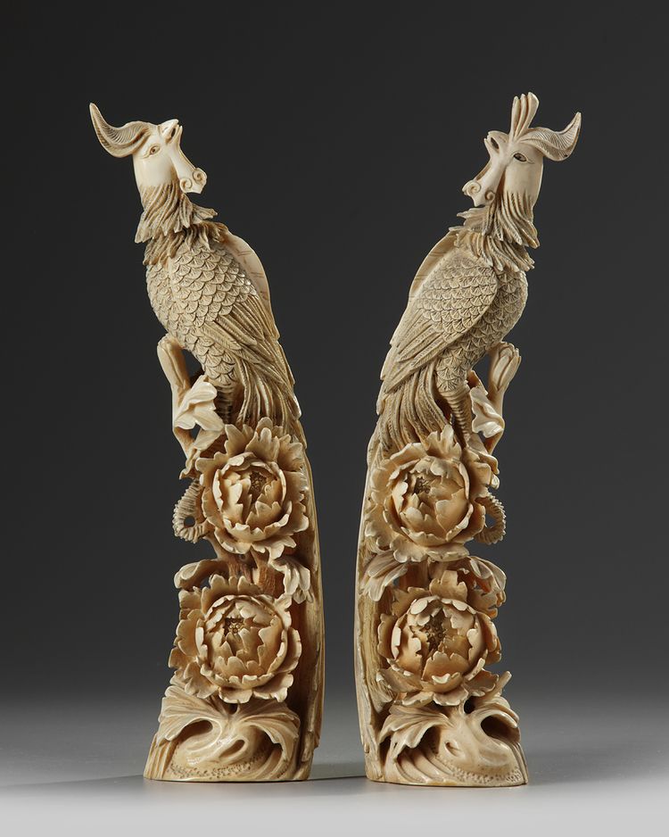 A PAIR OF CHINESE IVORY PHOENIX