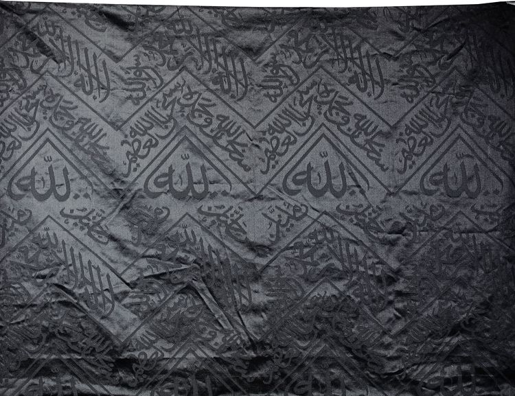 A BLACK KAABA KISWAH TEXTILE FRAGMENT