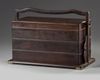 A CHINESE HONGMU THREE-TIERED PICNIC BOX, TIHE 