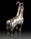 AN ACHAEMENID SILVER FIGURINE OF A MOUNTAIN GOAT (MOUFLON) 6TH CENTURY B.C