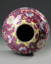 A CHINESE FAMILLE ROSE RUBY GROUND VASE, 19TH/20TH CENTURY