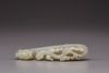 A pale celadon jade belt hook