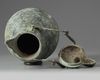 A large Chinese bronze hinged ewer and cover