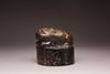 A dark jade seal