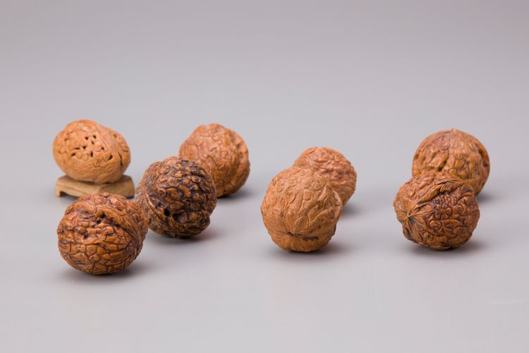 Eight Chinese carved walnuts