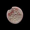 AN EARLY ISLAMIC GLASS WEIGHT OF HALF DINAR