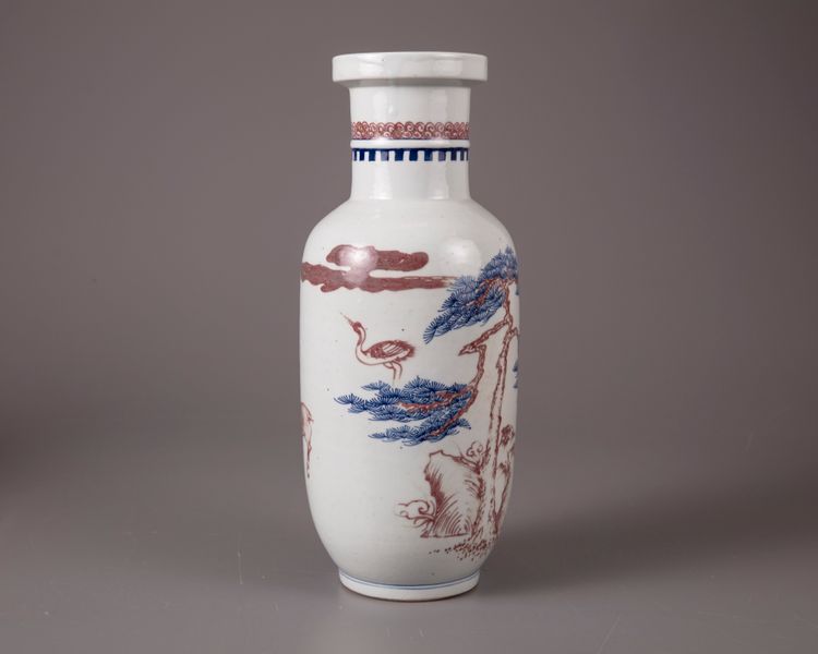 A blue and white copper-red 'Crane and Deer' rouleau vase