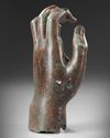 A ROMAN BRONZE FEMALE LEFT HAND, CIRCA 1ST CENTURY AD