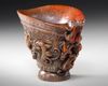 A CHINESE CARVED BUFFALO HORN LIBATION CUP, 19TH CENTURY