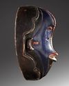 AN AFRICAN MASK, 20TH CENTURY