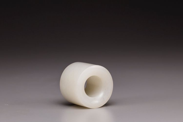 A large white jade archer's ring