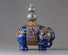 A lapis lazuli carving of a elephant with cloisonné mounts and stand