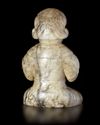 A CREAMY WHITE JADE OF A SHENG-PLAYING MUSICIAN, CHINA, HAN DYNASTY (206 BC-220 AD)