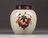 A Chinese celadon-ground 'nine peaches' ovoid jar