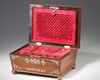 A WOODEN MOTHER-OF-PEARL INLAID BOX