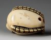 A JAPANESE IVORY NETSUKE OF THE SHAPE OF A SPARROW, SECOND HALF 19TH CENTURY