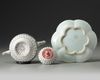 A CHINESE PINK-GROUND FAMILLE ROSE MOULDED 'CHRYSANTHEMUM' TEAPOT, COVER AND STAND