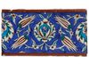 AN OTTOMAN IZNIK POTTERY TILE, TURKEY, 17TH CENTURY
