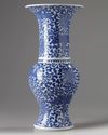 A Chinese blue and white 'scrolling lotus' phoenix tail vase