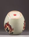 A Chinese celadon-ground 'nine peaches' ovoid jar